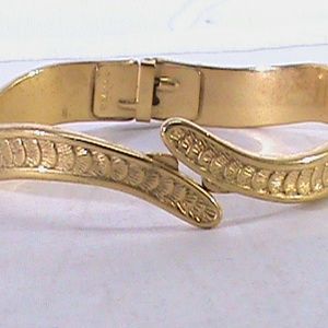 MONET Gold Toned Hinged Cuff Bracelet